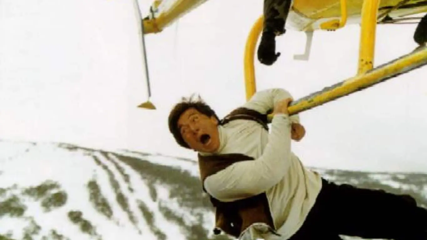 Top 10 Stunts of Jackie Chan - The Snowboard Leap – First Strike (1996)