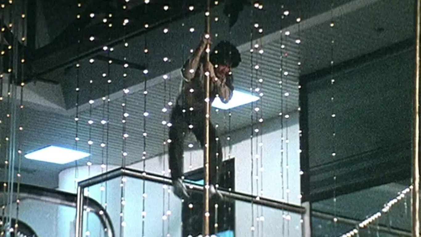 Top 10 Stunts of Jackie Chan - The Pole Slide – Police Story (1985)